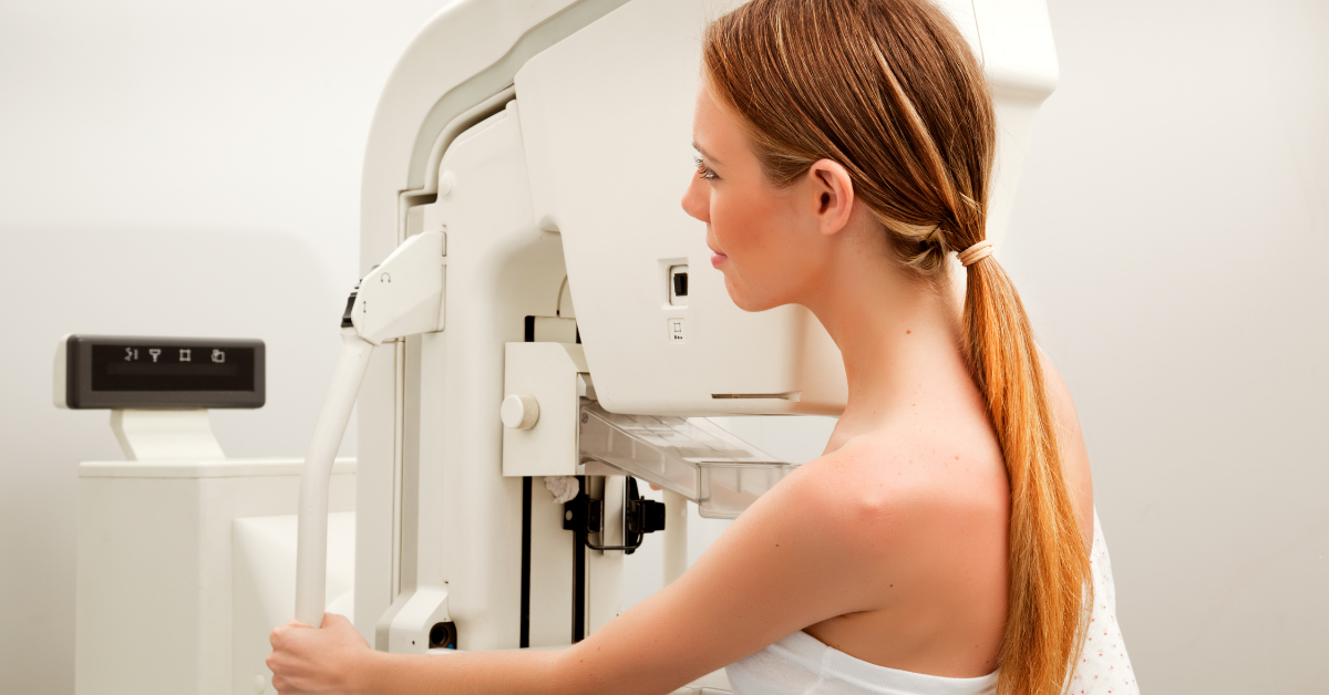 Woman getting mammogram