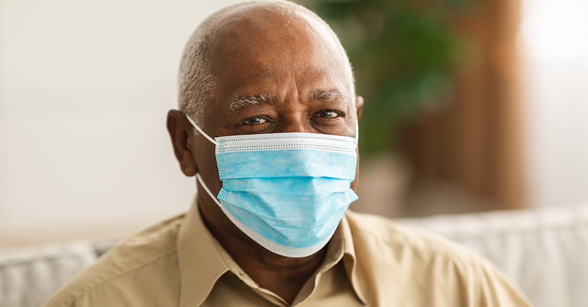 Senior patient wearing a mask