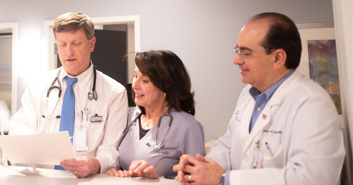 Tryon doctors and a nurse in a clinic